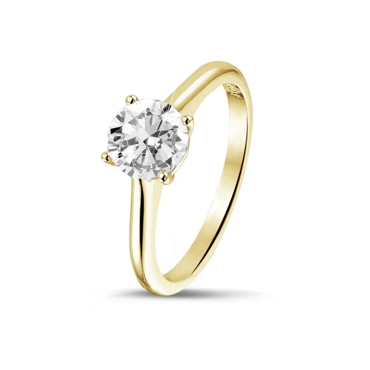 1.00 quilates anillo solitario en oro amarillo con un diamante redondo y 4 grapas 