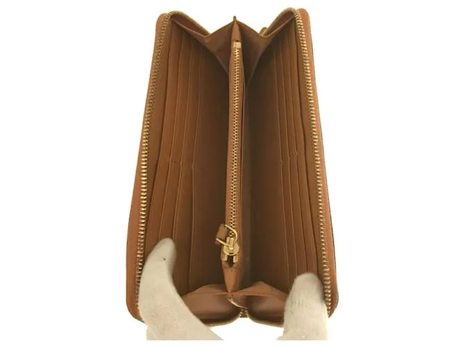 Cartera larga MCM en cuero camel Camello 
