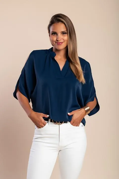 Elegante blusa holgada con escote en 