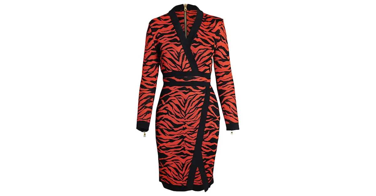 Vestido de punto estampado con efecto cruzado en viscosa naranja de Balmain Impresión de pitón 