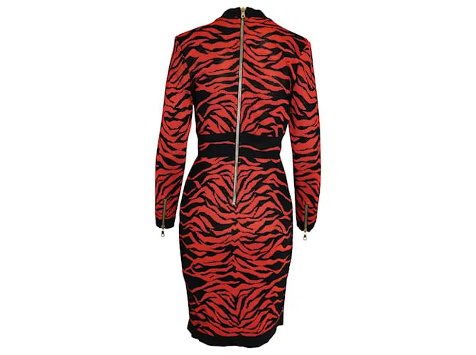 Vestido de punto estampado con efecto cruzado en viscosa naranja de Balmain Impresión de pitón 