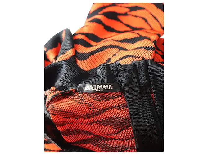 Vestido de punto estampado con efecto cruzado en viscosa naranja de Balmain Impresión de pitón 